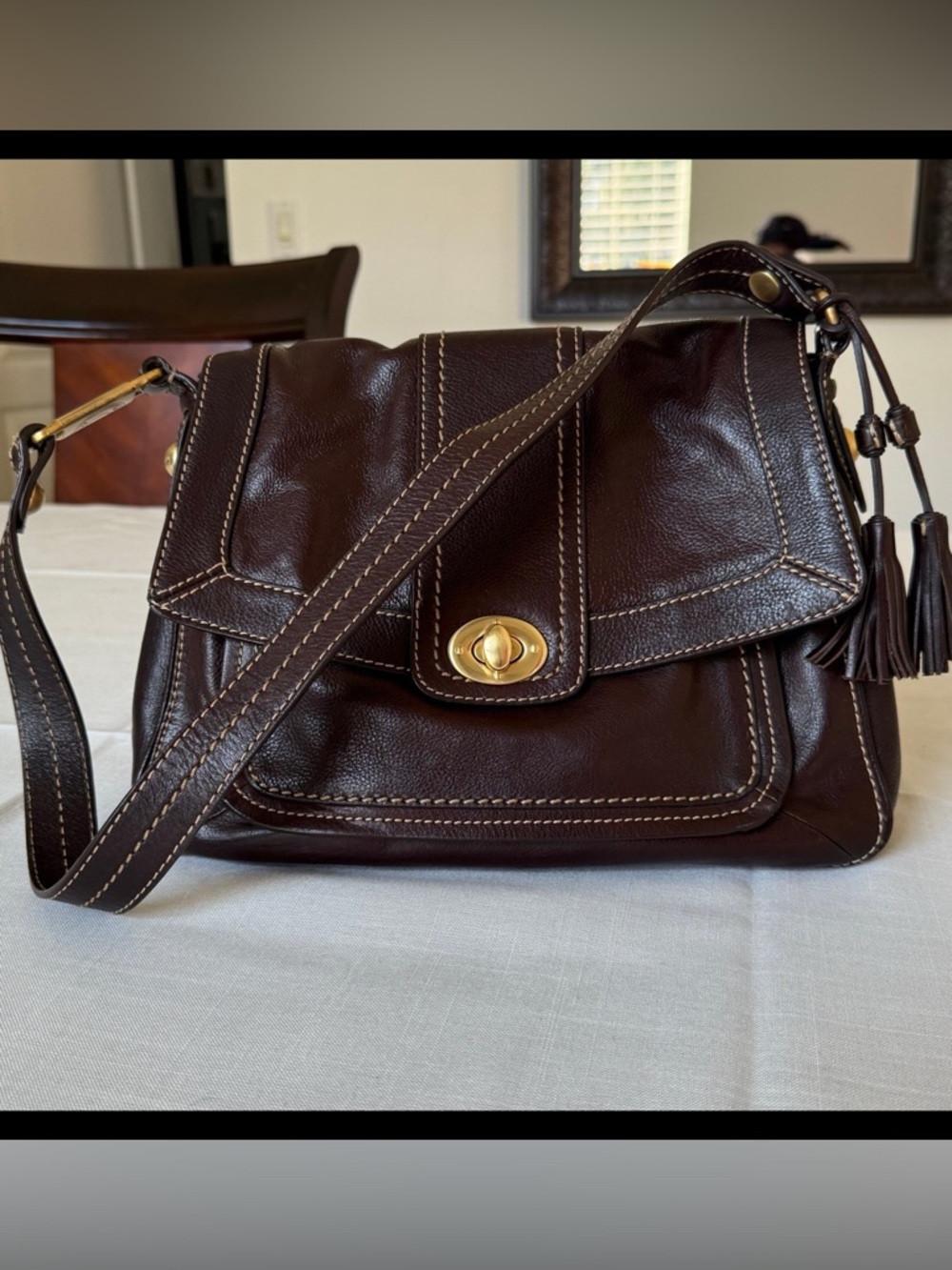 The Sak Brown Pebbled Leather Flap Turncock Gold Accent Shoulder Bag